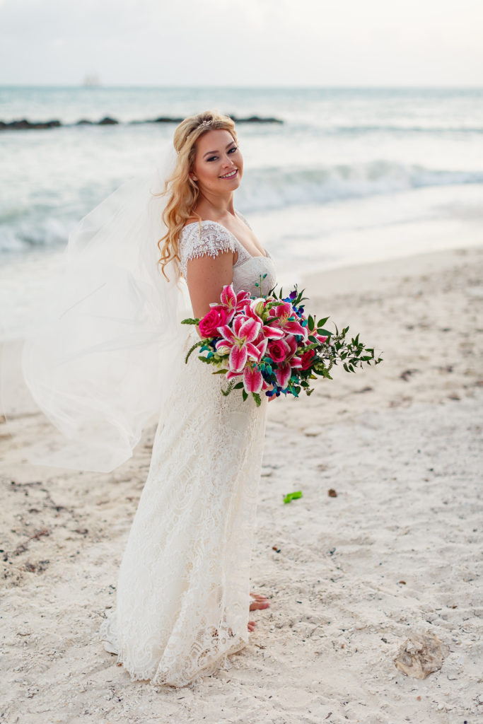 bride on the beach fort zachary taylor state park wedding